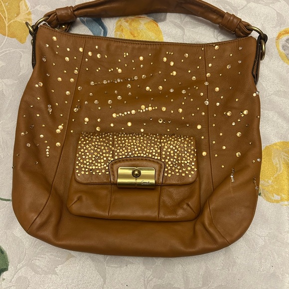 Coach Handbags - Up crafted Coach Women’s Brown Leather Studded Hobo Bag